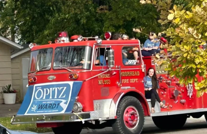 Moorhead City Council candidate Sarah Opitz’s use of fire truck during parade goes to a hearing — Horace Government news